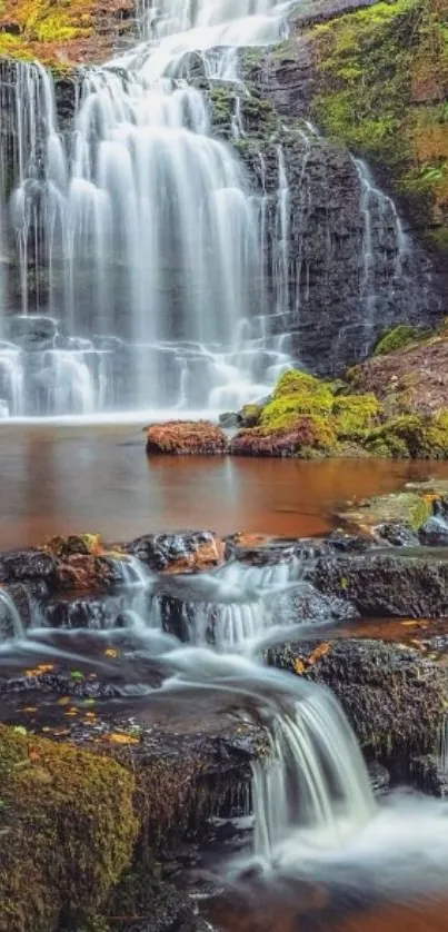 Beautiful waterfall cascading over mossy rocks.