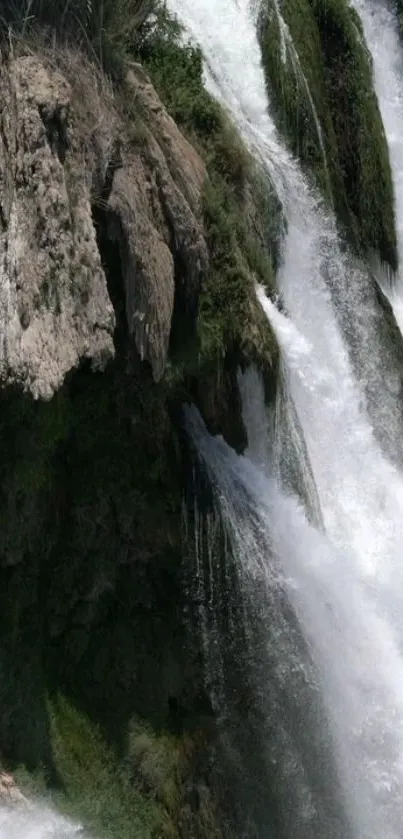 A serene waterfall cascading over rugged rocks.