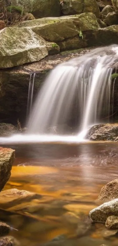 Serene waterfall with rocks and lush greenery.