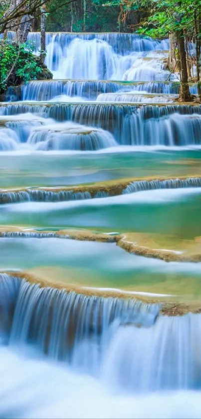 Serene waterfall cascading over rocks surrounded by lush green foliage.