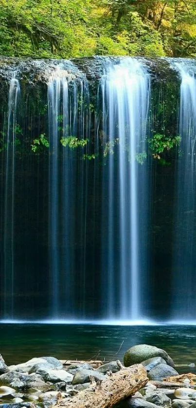 Waterfall with lush green forest background, perfect for mobile wallpaper.