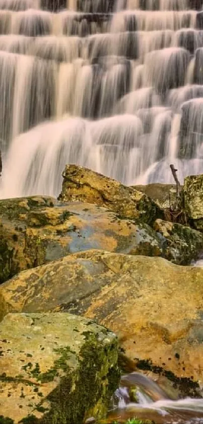 Serene waterfall over rocks in nature.