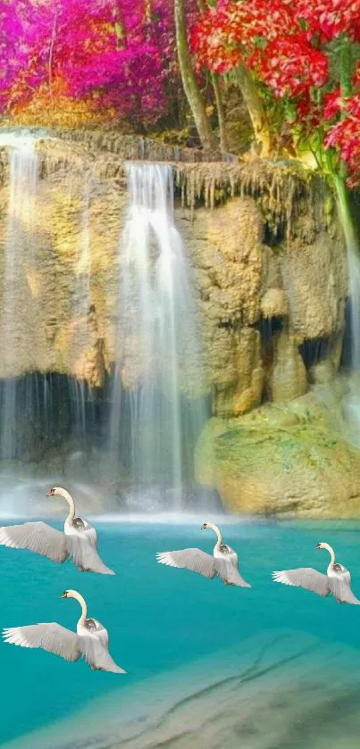 Swans glide gracefully on turquoise water beneath a vibrant waterfall.