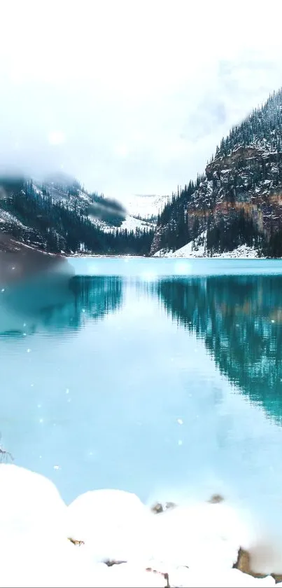A serene winter lake with mountain reflection and snow-covered shore.