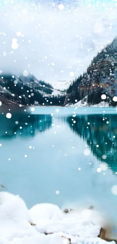 Person overlooking a serene snow-covered lake with mountains.