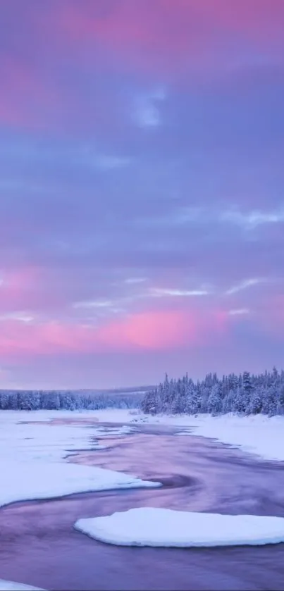 Winter landscape with pink sky and snowy riverbend.