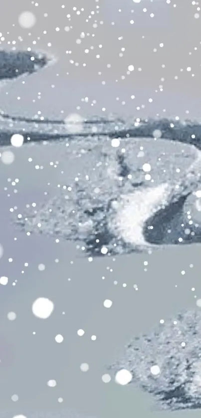 Serene winter landscape with snow trails and solitary tree.