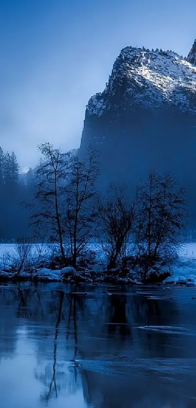 Serene winter mountain with calm lake view.