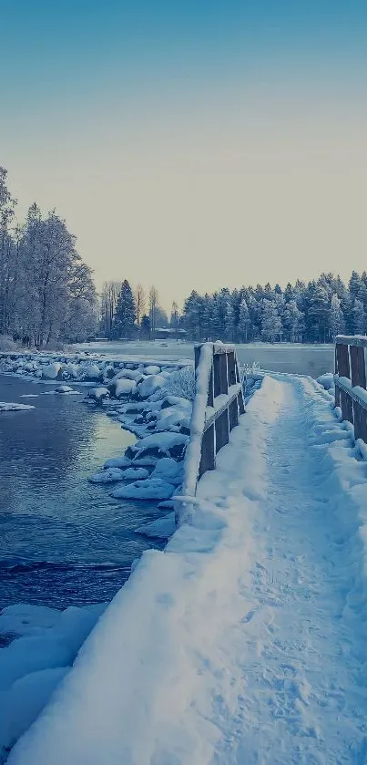 Snow-covered bridge over a serene icy river with a winter landscape.