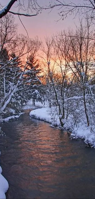 Serene winter stream under a vibrant sunset sky.