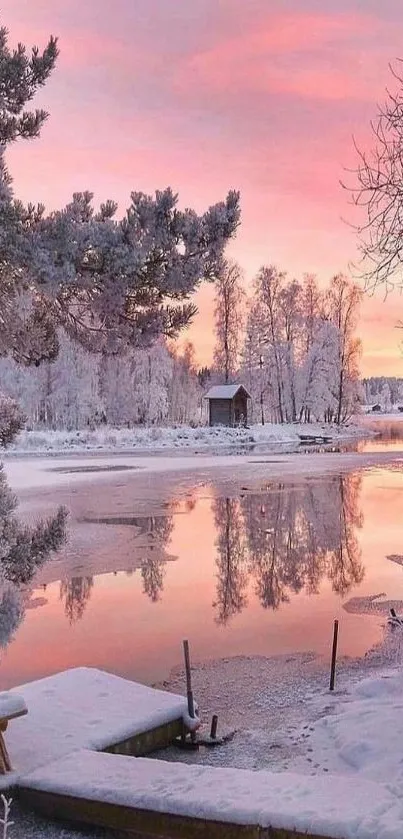 Beautiful winter sunset with pink sky reflecting on snow-covered landscape.