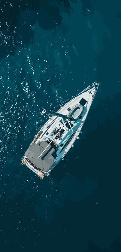 A tranquil yacht sailing on deep blue ocean waters, view from above.