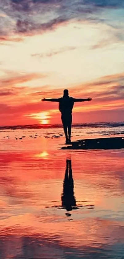 Tranquil sunset over water with silhouette on beach