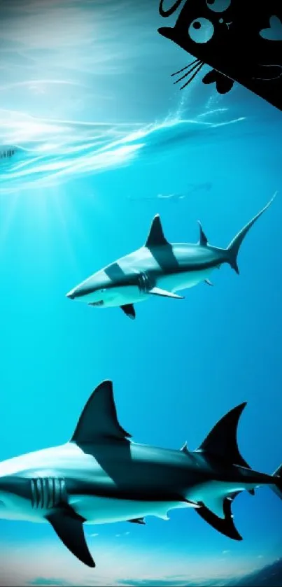 Wallpaper featuring sharks and a playful cartoon cat in a blue ocean scenery.