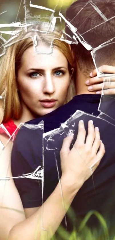 Romantic embrace with shattered glass effect on mobile wallpaper.