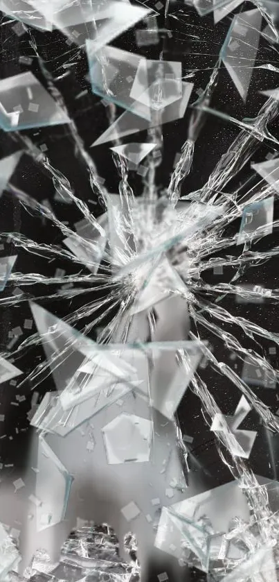 Shattered glass design on a mobile screen wallpaper.