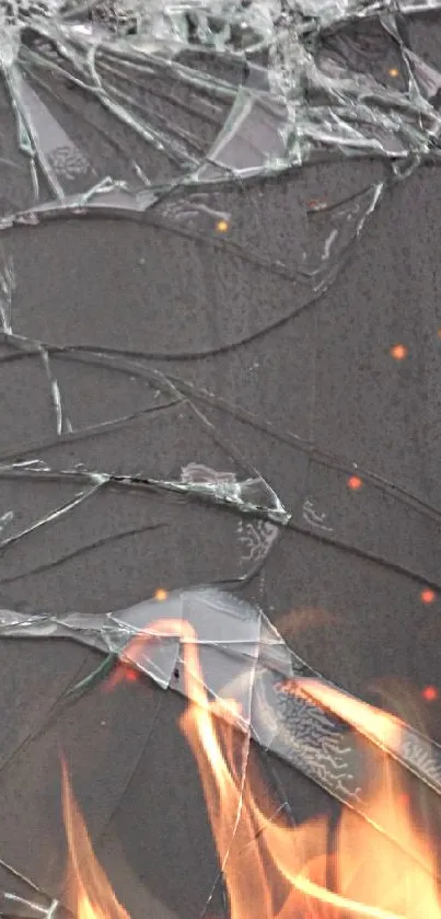 Shattered glass wallpaper with intricate gray cracks on a smartphone screen.