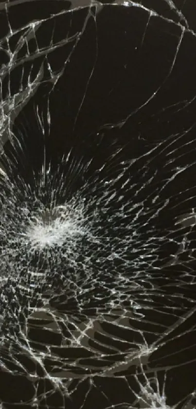 Shattered glass pattern in dark tones on phone wallpaper.