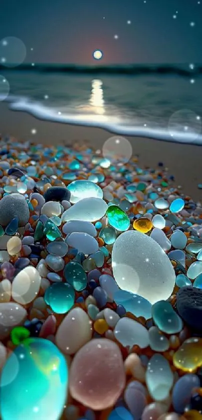 Colorful stones on a moonlit beach shoreline with the ocean.