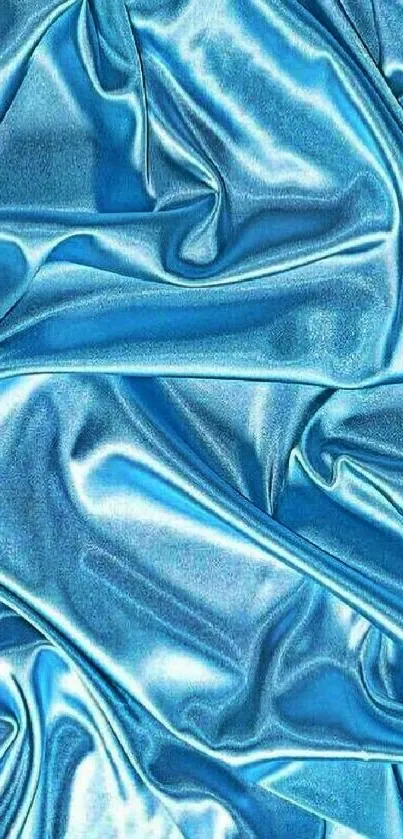 Shimmering blue satin fabric with elegant texture.