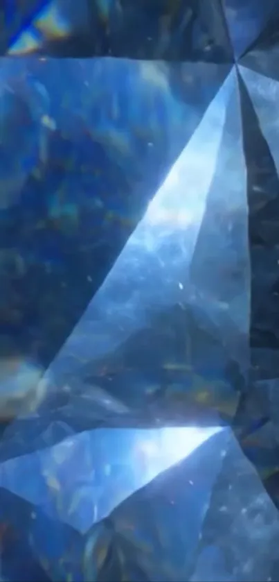 Shimmering blue gemstone with faceted design.