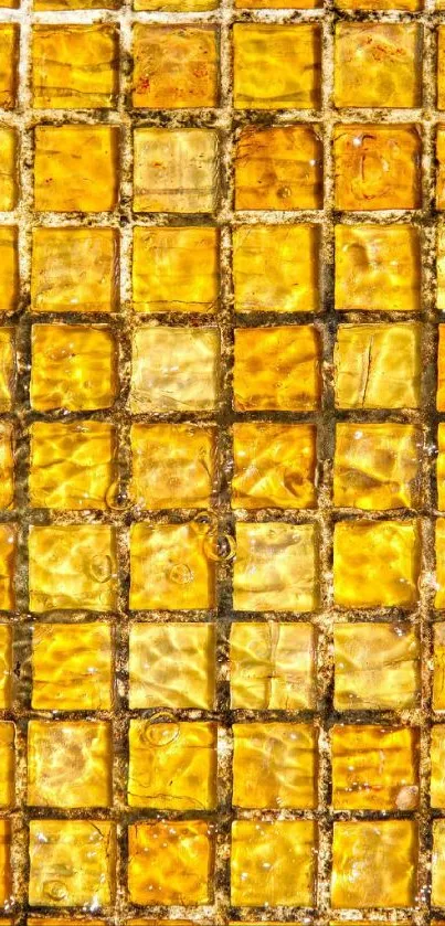 Golden mosaic tile background with reflective shine.