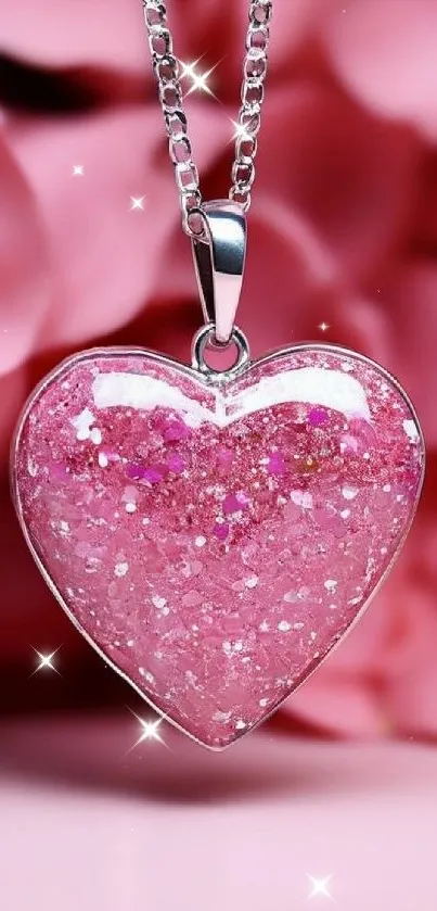Shimmering pink heart necklace on floral background.