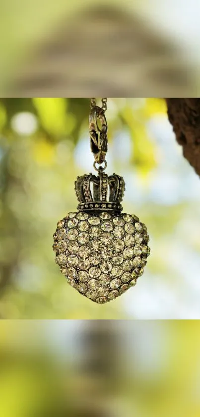 Elegant heart-shaped jewel pendant in a nature background.