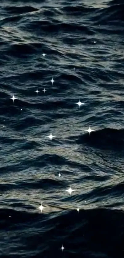 Mobile wallpaper of shimmering stars over dark ocean waves.