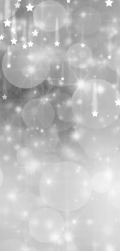 Shimmering silver bokeh mobile wallpaper with glowing light circles.