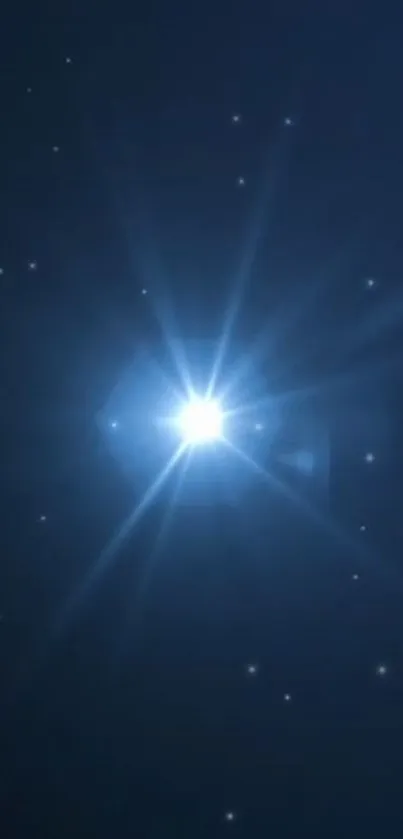 Luminous starburst on dark blue starry background.