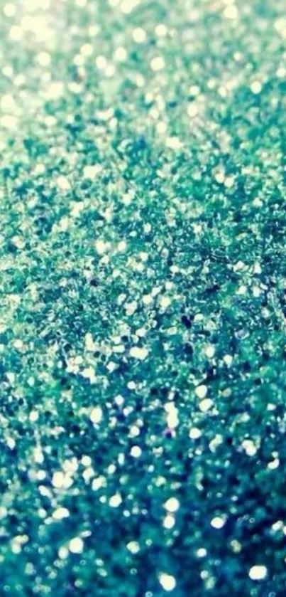 Teal glitter wallpaper with a shimmering effect.