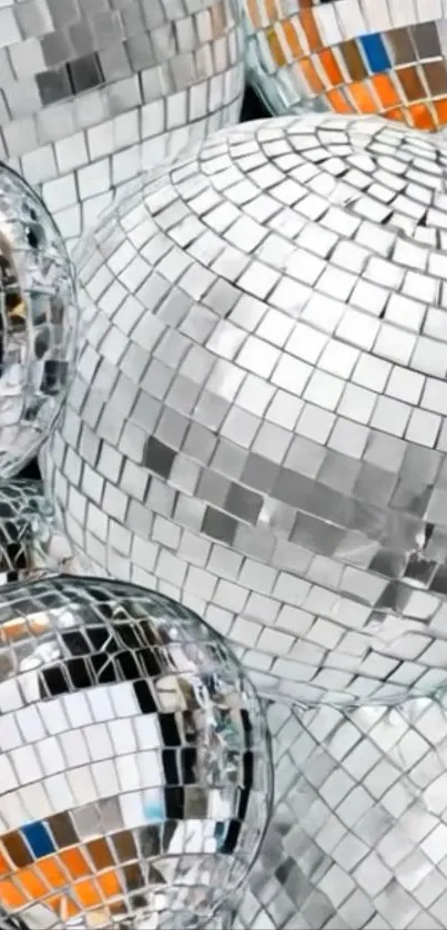 Shiny disco balls with reflective tiles.