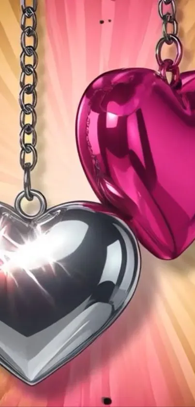 Glossy pink and silver heart-shaped pendants on chains, vibrant background.