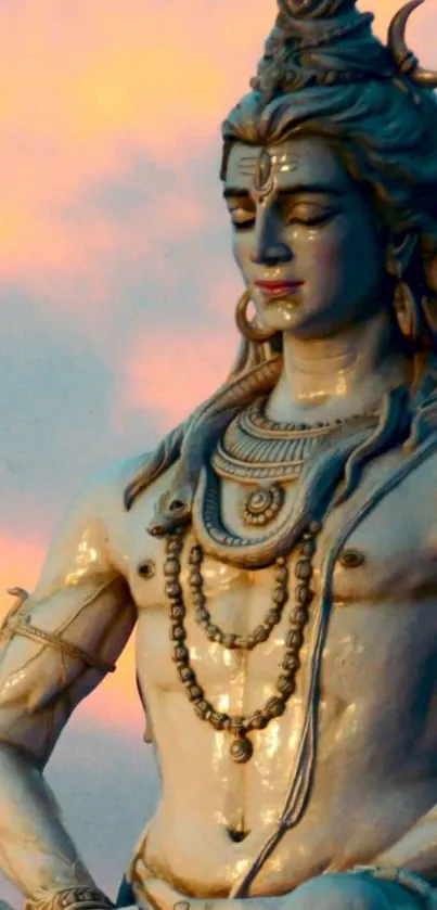 Lord Shiva meditating at sunset in calming wallpaper.