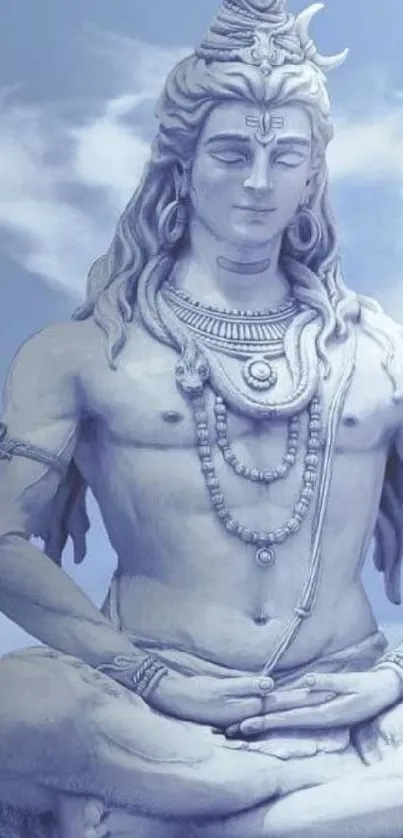 Shiva meditative statue in soft blue tones.