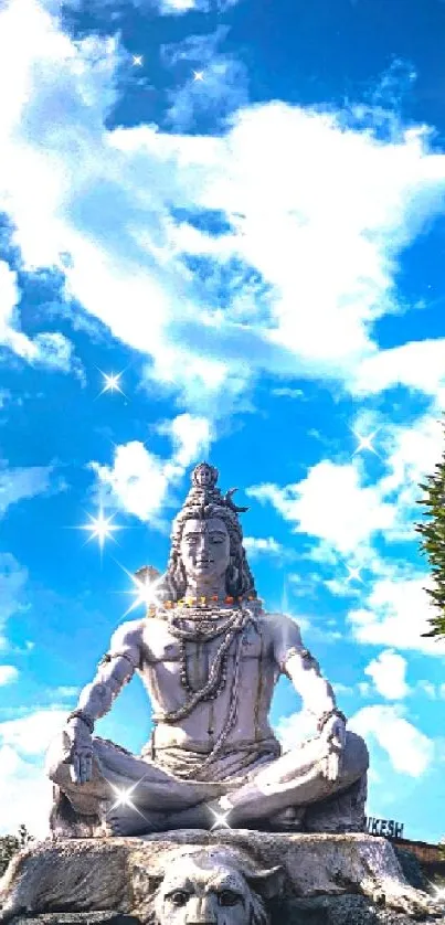 Majestic Shiva statue under vibrant blue skies.