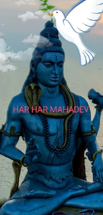 Lord Shiva blue statue with peace dove at sunset.