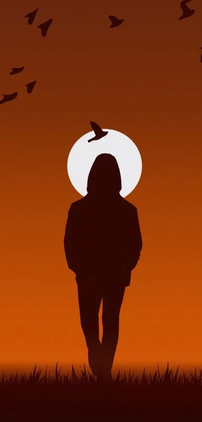 Silhouette standing against a vibrant orange sunset with birds flying.