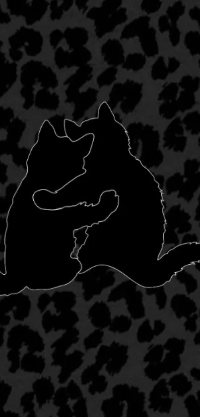 Silhouette of two cats hugging on leopard print background.