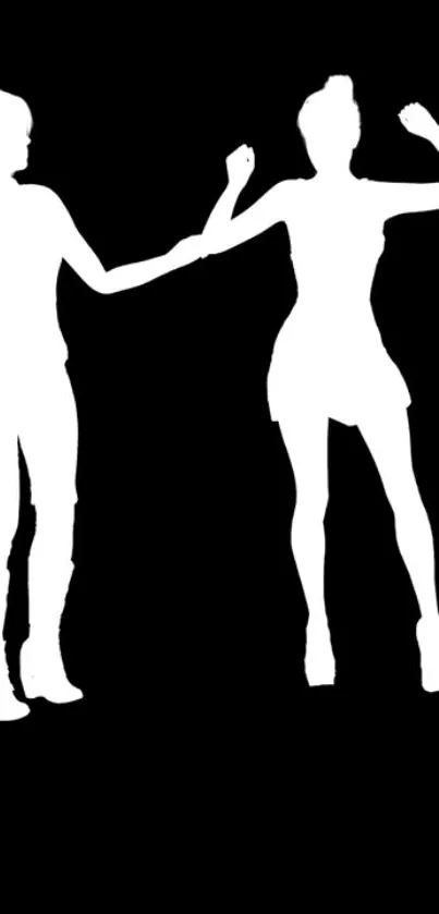 Silhouette of dancing figures on black background wallpaper.