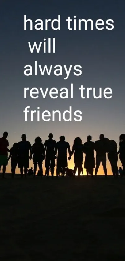 Silhouette of friends with motivational quote at sunset.