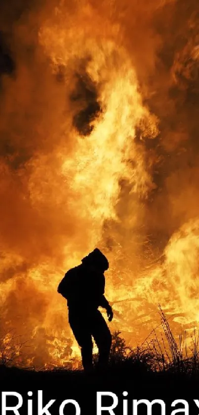 Silhouette standing before a roaring fire, surrounded by vibrant orange flames.