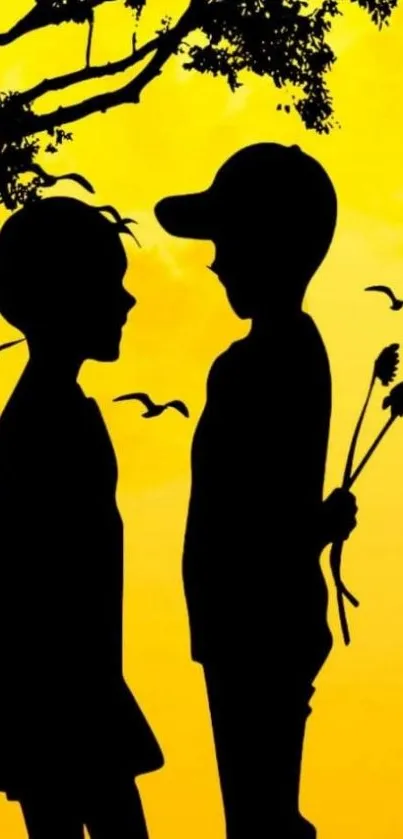 Silhouette of kids in love under tree, vibrant yellow background.