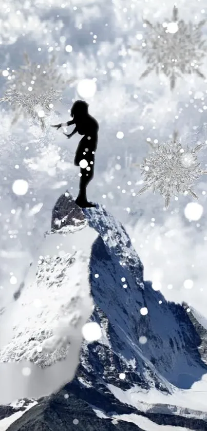 Silhouette stands atop a snowy mountain with snowflakes surrounding.