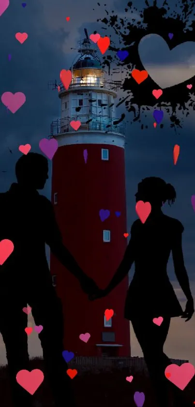 Silhouette couple by lighthouse with heart symbol in dark blue sky backdrop.