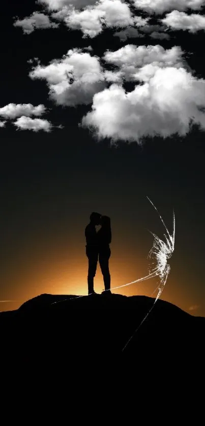 Silhouette of a couple embracing at sunset with a warm orange glow.