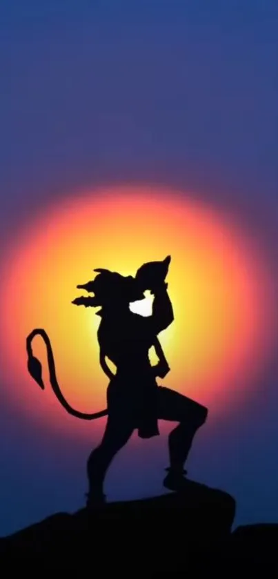 Silhouette of a mythical figure at sunset with orange and blue hues.