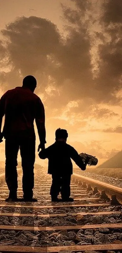 Silhouette of father and child on railway at sunset, surrounded by trees and mountains.
