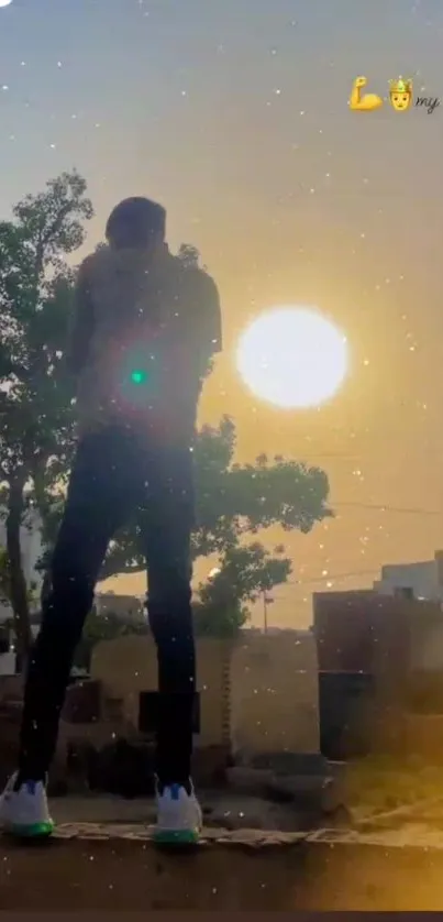 Silhouette of person against sunset on rooftop with golden sky.